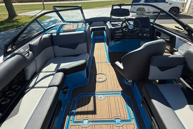 Slide: The Image of 2020 Moomba Makai boat interior with modern seating and sleek dashboard design. - 5