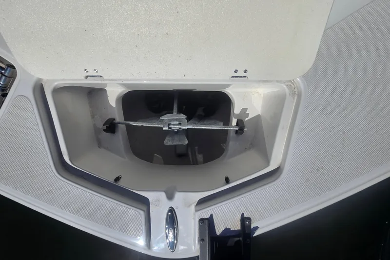 Slide: The Image of Open anchor compartment on 2016 Hurricane SunDeck 2200 DC OB boat. - 8