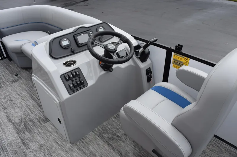 Slide: The Image of 2026 Bentley Pontoons Bolt 223 interior with steering console and seating. - 10
