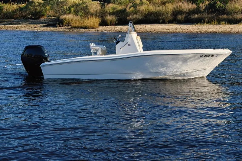 The Image of 2019 Pioneer 175 Baysport boat on water near a lighthouse. - 0