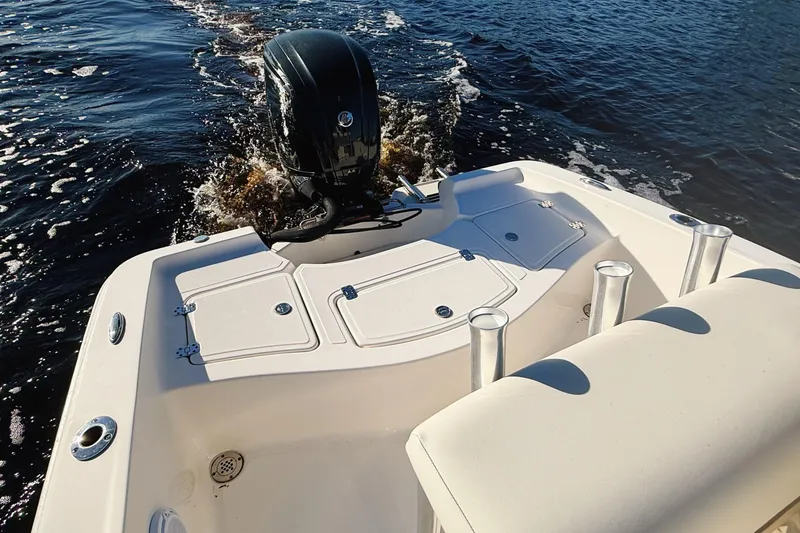 Slide: The Image of 2019 Pioneer 175 Baysport boat with outboard motor on open water. - 5