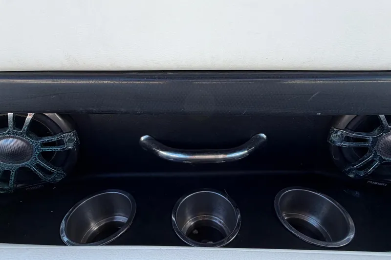 Slide: The Image of 2020 Regal 2300 Bowrider interior with speakers and cup holders. - 15