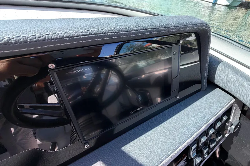 Slide: The Image of 2020 Regal 2300 Bowrider dashboard with Garmin GPSMAP display. - 20