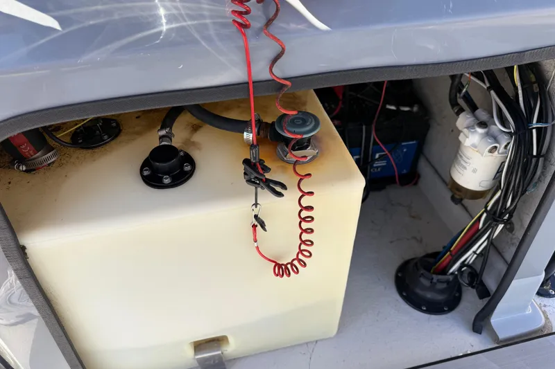 Slide: The Image of 2022 Shoalwater 23 Catamaran fuel tank and wiring compartment. - 10