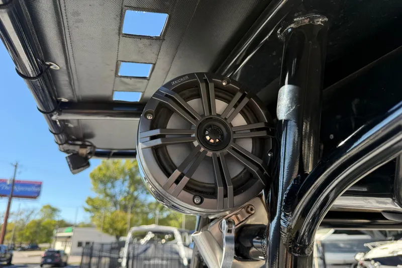 Slide: The Image of Kicker speaker on 2022 Shoalwater 23 Catamaran, mounted under canopy. - 16