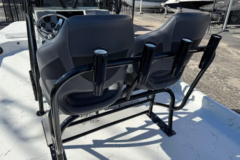 Slide: The Image of 2022 Shoalwater 23 Catamaran interior with dual seats and rod holders. - 28