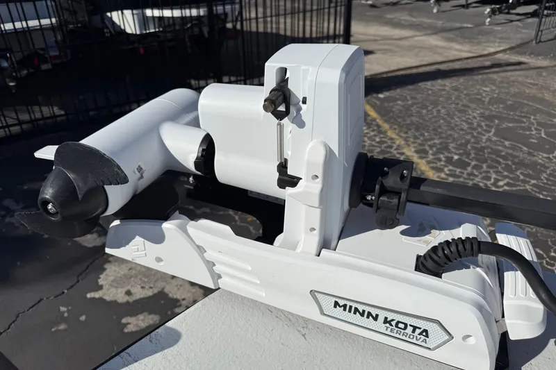 Slide: The Image of Minn Kota Terrova motor on 2022 Shoalwater 23 Catamaran, outdoor setting. - 35