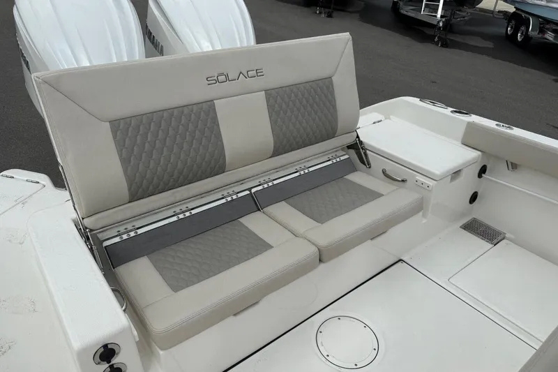 Slide: The Image of Luxury seating on 2025 Solace 28 HCS boat, featuring elegant design and comfort. - 7