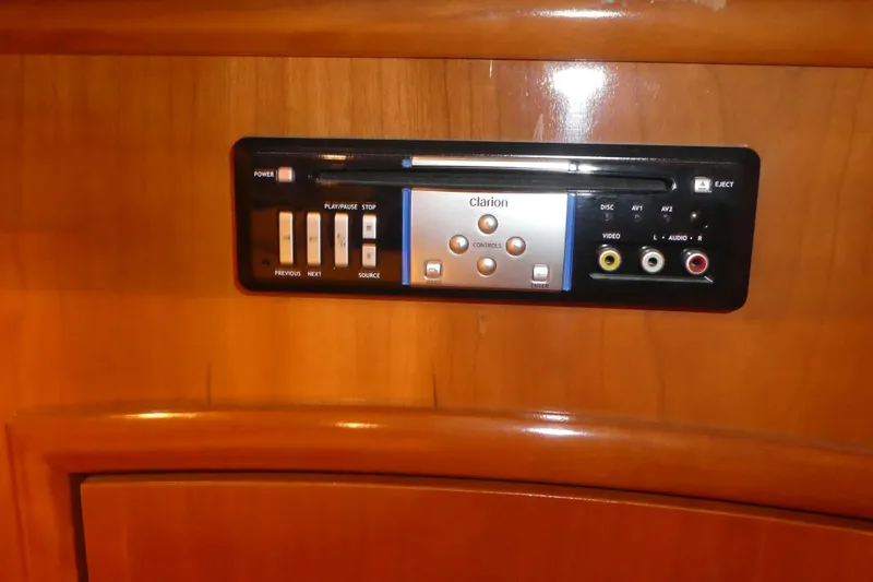 Slide: The Image of Clarion audio system in 2006 Carver 366 Motor Yacht, featuring control buttons and AV inputs. - 37