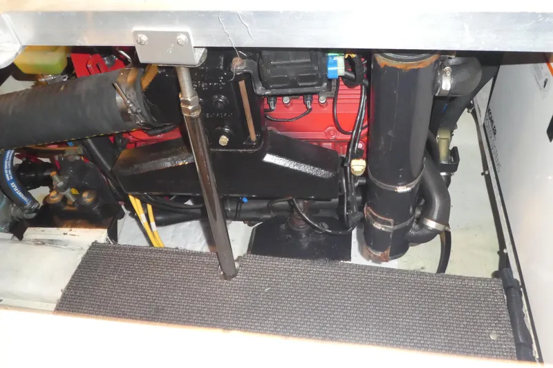 Slide: The Image of Engine compartment of a 2006 Carver 366 Motor Yacht, showcasing mechanical components. - 44