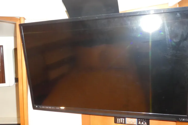 Slide: The Image of Flat-screen TV inside 2006 Carver 366 Motor Yacht cabin. - 36