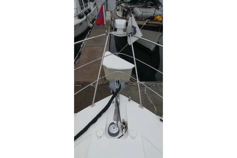 Slide: The Image of Bow view of 2006 Carver 366 Motor Yacht docked at marina. - 50