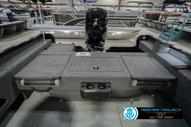 Slide: The Image of 2026 Lund 1675 Adventure Sport boat interior with motor, showcased at Reeder Trausch Marine. - 22