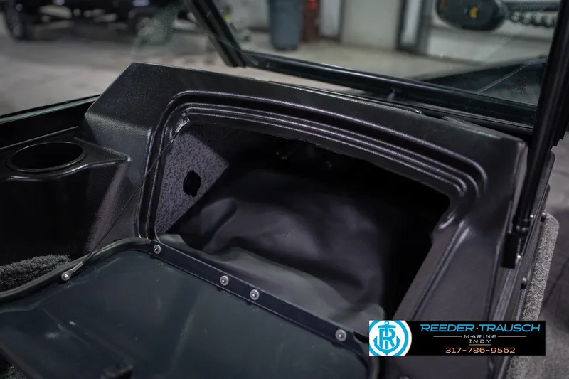 Slide: The Image of 2026 Lund 1675 Adventure Sport boat interior storage compartment. - 27