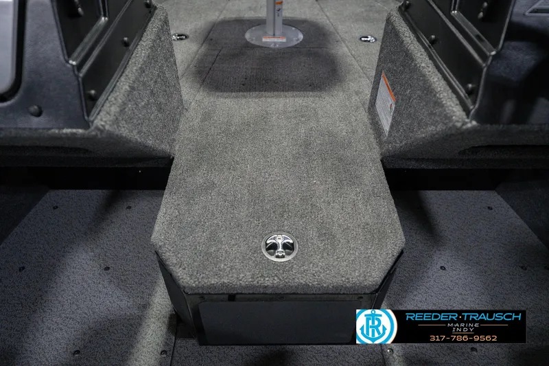 Slide: The Image of Interior view of 2026 Lund 1675 Adventure Sport boat with carpeted flooring. - 28