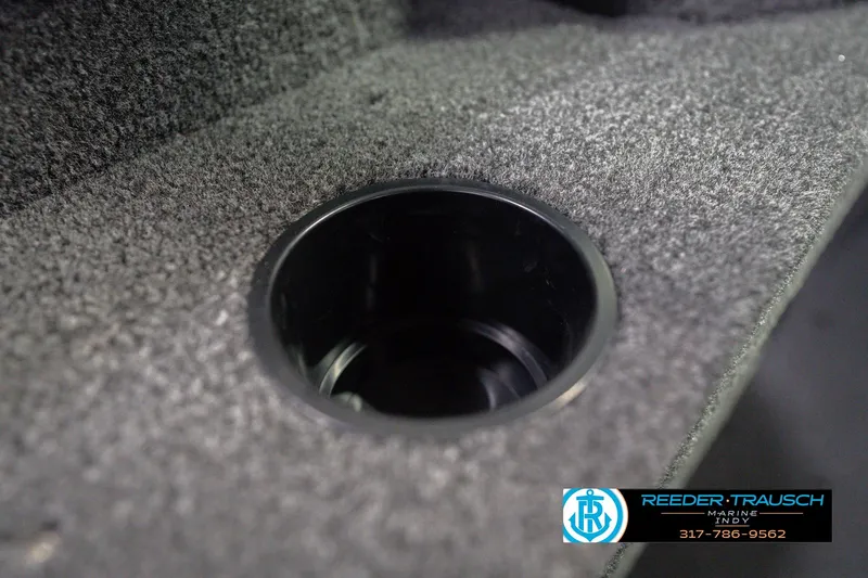 Slide: The Image of Cup holder in 2026 Lund 1675 Adventure Sport boat interior, featuring carpeted surface. - 45