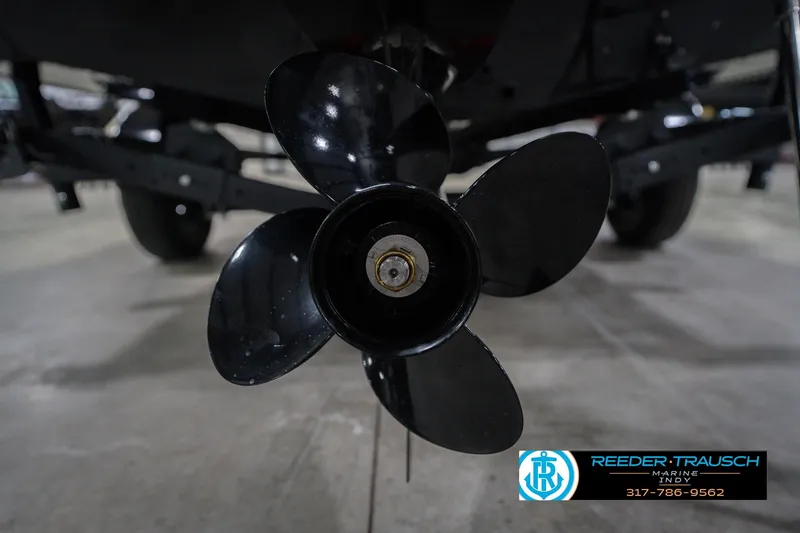 Slide: The Image of Close-up of a 2026 Lund 1675 Adventure Sport boat propeller in a showroom. - 51