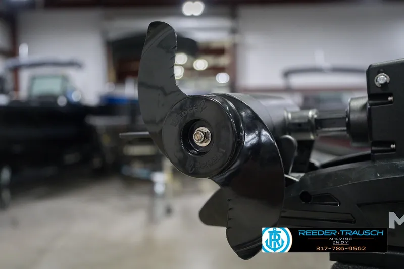 Slide: The Image of Close-up of a 2026 Lund 1675 Adventure Sport boat propeller in a showroom. - 55