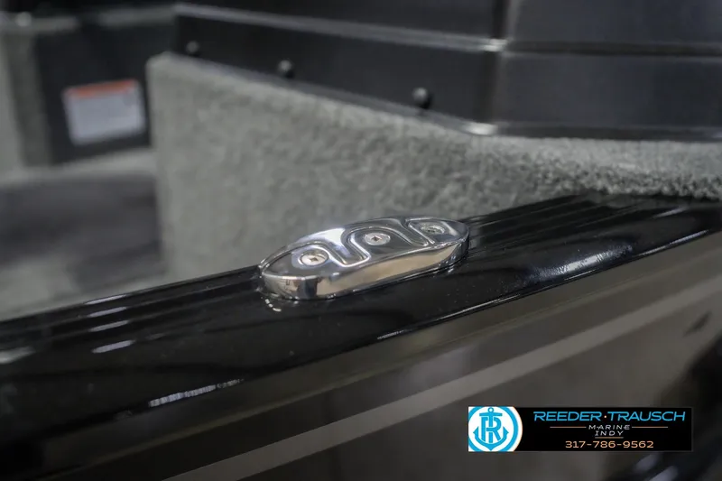 Slide: The Image of 2026 Lund 1675 Adventure Sport boat detail with Reeder-Trausch Marine logo. - 69