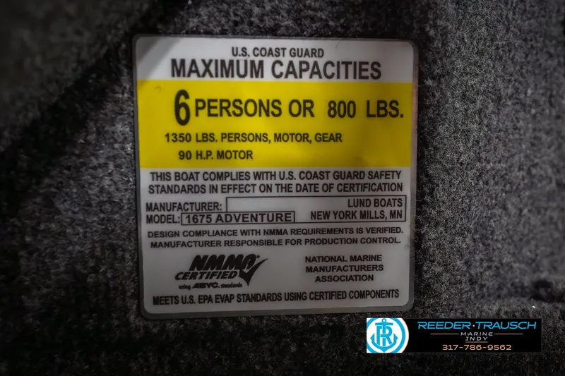 Slide: The Image of U.S. Coast Guard capacity label for 2026 Lund 1675 Adventure Sport boat, 6 persons or 800 lbs. - 71