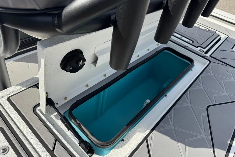 Slide: The Image of Open storage compartment on 2026 Avid 21 Recon ST boat deck. - 14