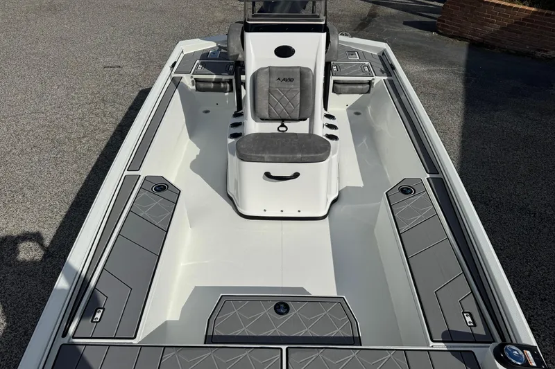Slide: The Image of 2026 Avid 21 Recon ST boat interior with gray seating and storage compartments. - 6