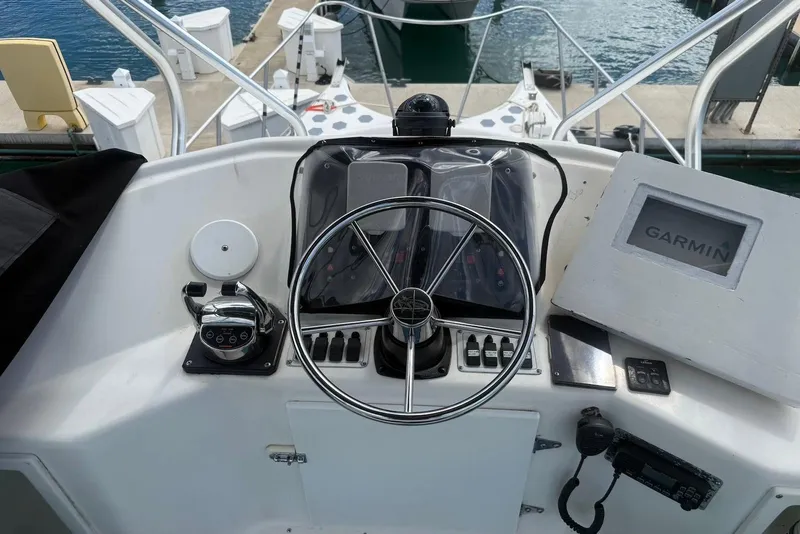Slide: The Image of Helm of 2007 Baha Cruisers 340 King Cat with Garmin navigation system. - 6