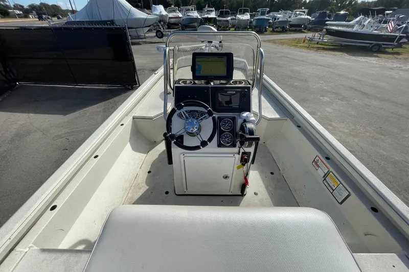 Slide: The Image of 2023 Ranger RB190 boat interior with steering console and navigation equipment. - 17