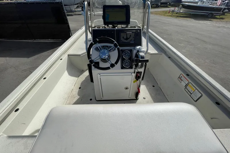Slide: The Image of 2023 Ranger RB190 boat interior with steering console and navigation equipment. - 18