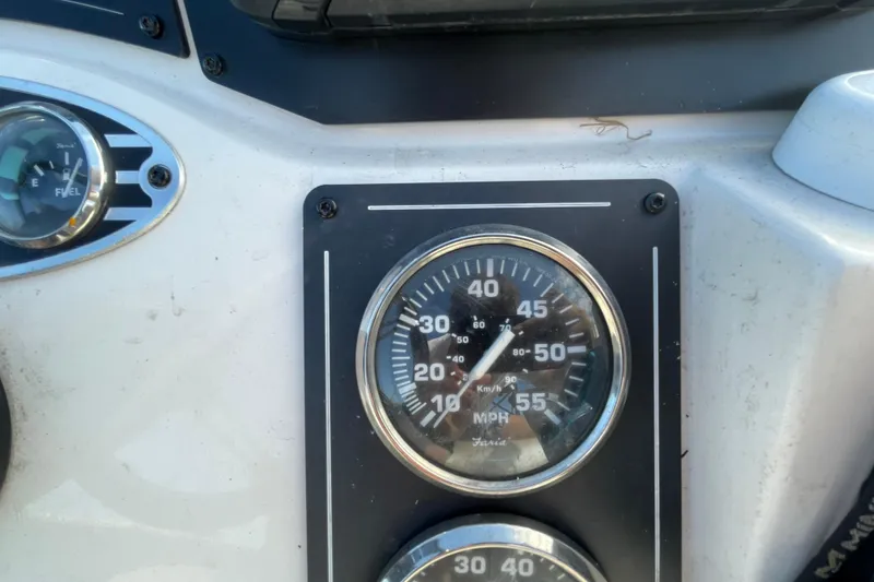 Slide: The Image of Dashboard of 2023 Ranger RB190 boat showing speedometer and fuel gauge. - 26