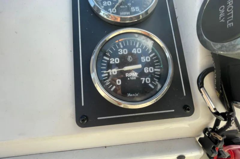 Slide: The Image of Close-up of 2023 Ranger RB190 boat RPM gauge, showing 700 RPM. - 27
