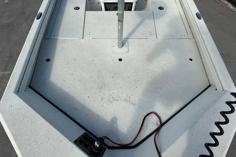 Slide: The Image of 2023 Ranger RB190 boat deck with storage compartments and wiring. - 45