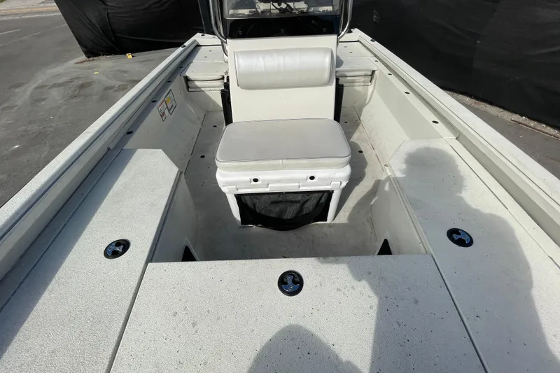 Slide: The Image of 2023 Ranger RB190 boat interior with seating and storage compartments. - 48