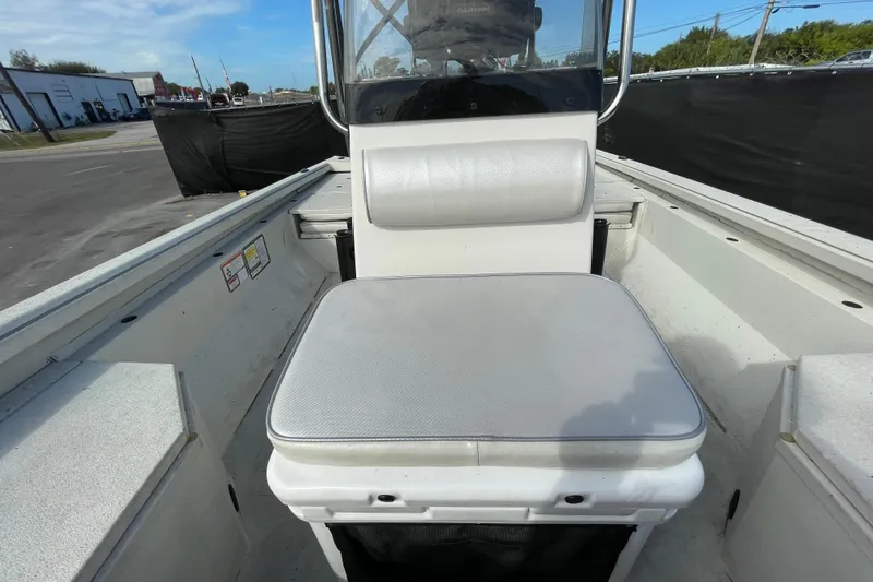 Slide: The Image of 2023 Ranger RB190 boat interior with cushioned seating and console. - 49
