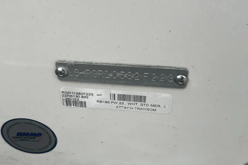 Slide: The Image of 2023 Ranger vehicle identification plate with serial numbers and NMMA certification label. - 60