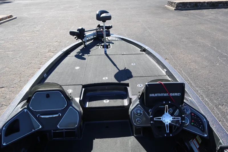 Slide: The Image of 2010 Ranger Z521 Comanche boat interior with Humminbird electronics and steering wheel. - 10