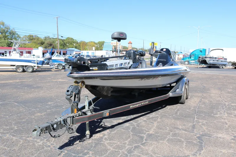 Slide: The Image of 2010 Ranger Z521 Comanche boat on trailer in outdoor lot. - 2