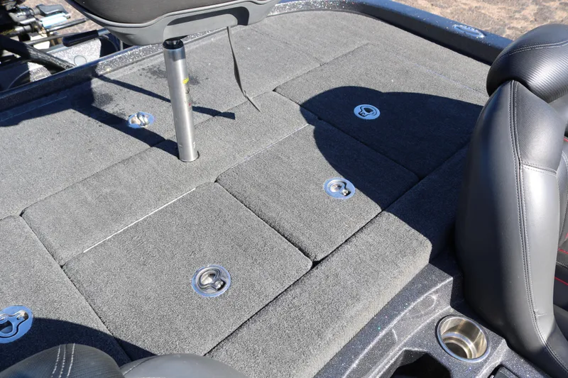 Slide: The Image of 2010 Ranger Z521 Comanche boat deck with storage compartments and seating. - 31