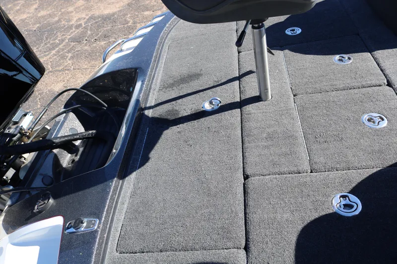 Slide: The Image of 2010 Ranger Z521 Comanche boat deck with carpeted surface and seat mount. - 37