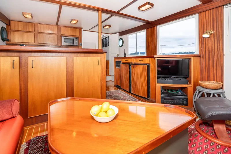 Slide: The Image of Interior of 1966 Willard Marine 47 with wood paneling and modern amenities. - 14