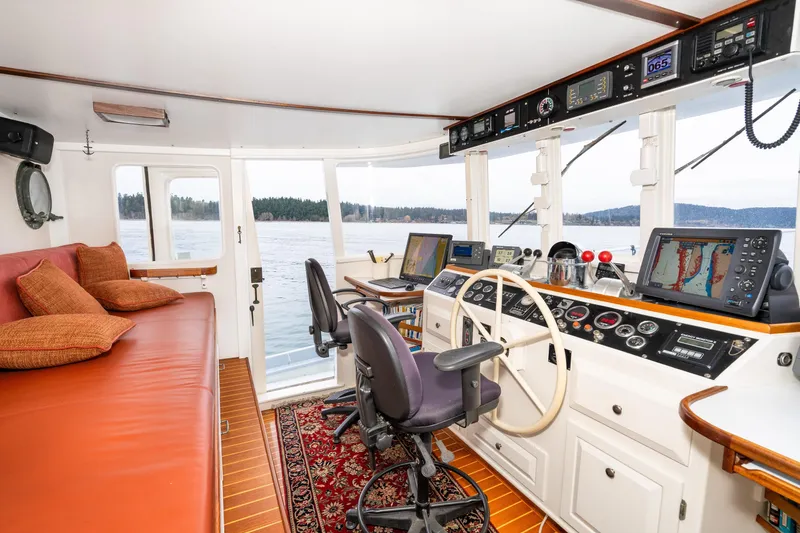 Slide: The Image of Interior of 1966 Willard Marine 47 boat with navigation equipment and seating. - 29