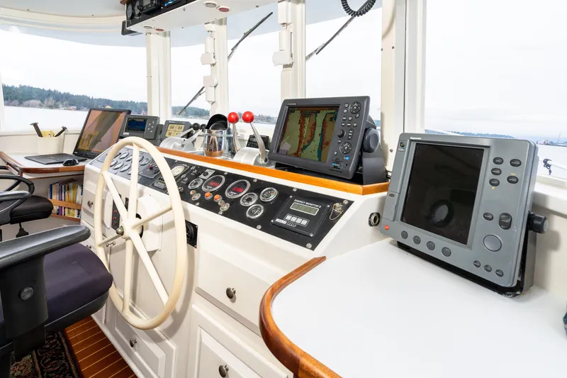 Slide: The Image of Interior of 1966 Willard Marine 47 boat with navigation equipment and steering wheel. - 32