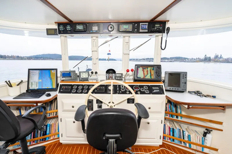 Slide: The Image of Interior view of a 1966 Willard Marine 47 boat cockpit with navigation equipment. - 33