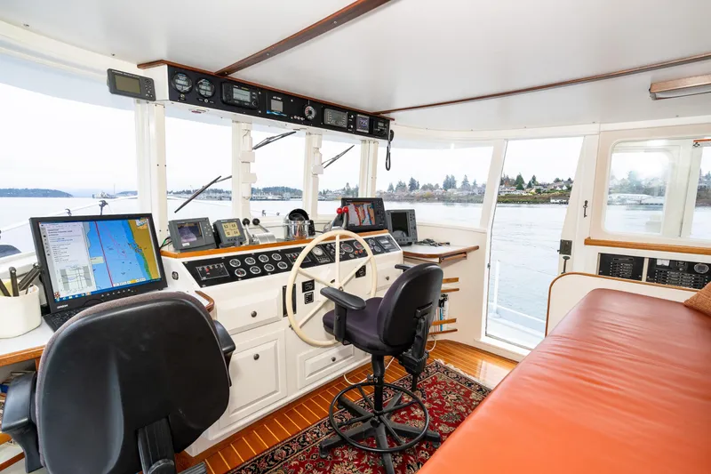 Slide: The Image of Interior of 1966 Willard Marine 47 boat with navigation equipment and seating. - 35