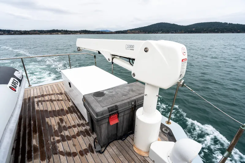 Slide: The Image of Deck of 1966 Willard Marine 47 boat with crane and storage boxes. - 44