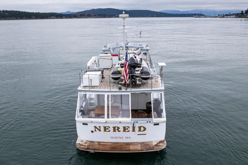 Slide: The Image of 1966 Willard Marine 47 boat named "Nereid" on calm water, Seattle, WA. - 69