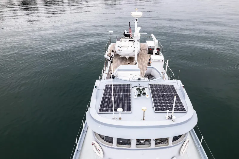 Slide: The Image of Aerial view of 1966 Willard Marine 47 boat with solar panels on deck. - 73