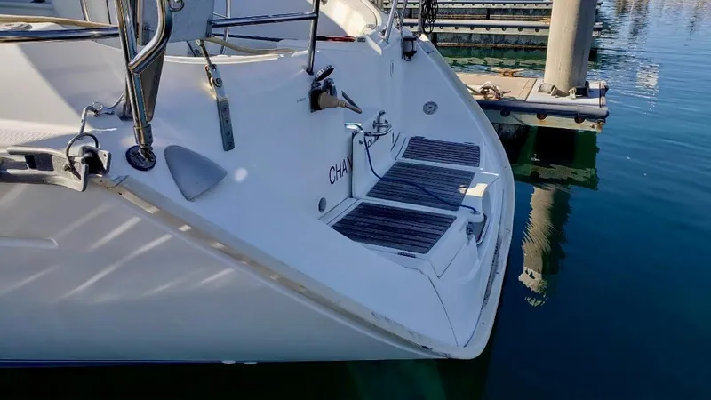 Slide: The Image of Beneteau Oceanis 440 sailboat stern view, docked in marina, 1993 model. - 17