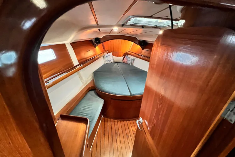 Slide: The Image of Cozy cabin interior of 1993 Beneteau Oceanis 440 sailboat with wooden finish. - 37