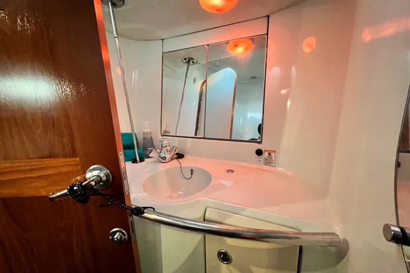 Slide: The Image of Bathroom interior of 1993 Beneteau Oceanis 440 yacht with sink and mirror. - 43
